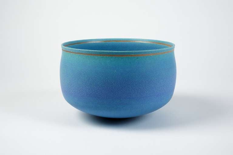 A blue dusky glazed stoneware cup with unglazed clay’s border. 
Handwritten signature under the base.
Circa 2011-2012. 
H :  6 inch  D : 9 inch.
