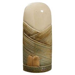 A stoneware sculpture by Antoine de Vinck