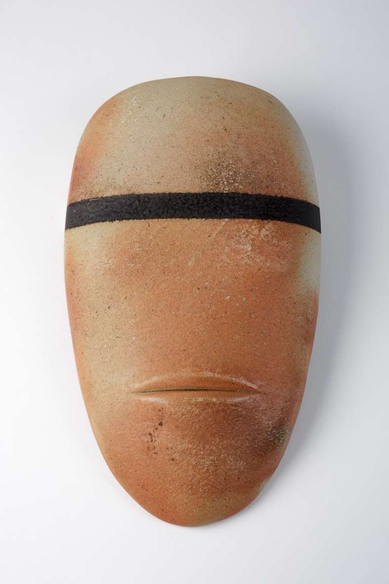 A rare stoneware mask by Antoine De Vinck (1924-1992). 
Circa 1990. 
Artist monogram on the back.
Unique Piece.