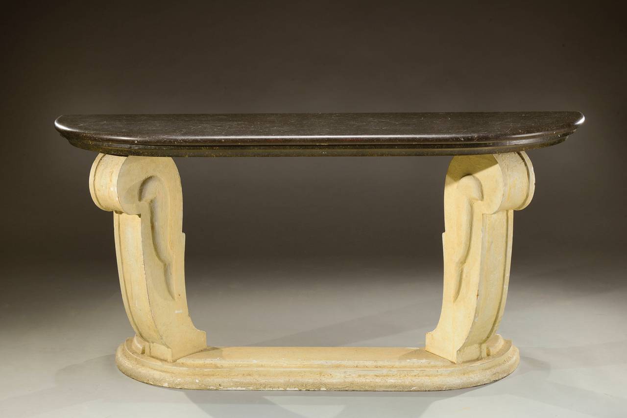 A console with a half moon marble top on two coiling plaster uprights,
circa 1940.
Measures: H 33 ¾ in, L 67 ¾ in, D 20 ½ in.