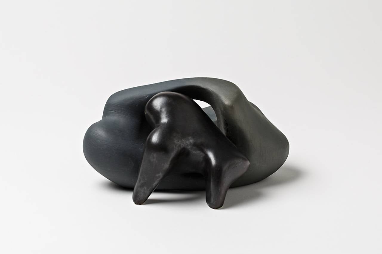 An elegant porcelain sculpture by Tim Orr with black glaze decoration.
Signed under the base,
circa 1970.