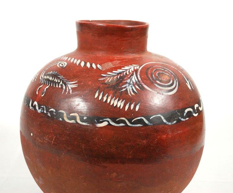 An excellent antique piece from the town of Huacinto in Michoacan.  This pot is called cantaro and mostly was used for transportation and storage of drinking water. Few of thee pieces have survived.  Clearly a utilitarian piece decorated by