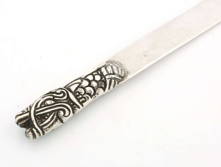 Gorgeous Mexican silver letter opener from the 1940's .  This letter opener is stamped SILVER MEXICO and the handle depicts the Aztec God Quetzalcoatl.