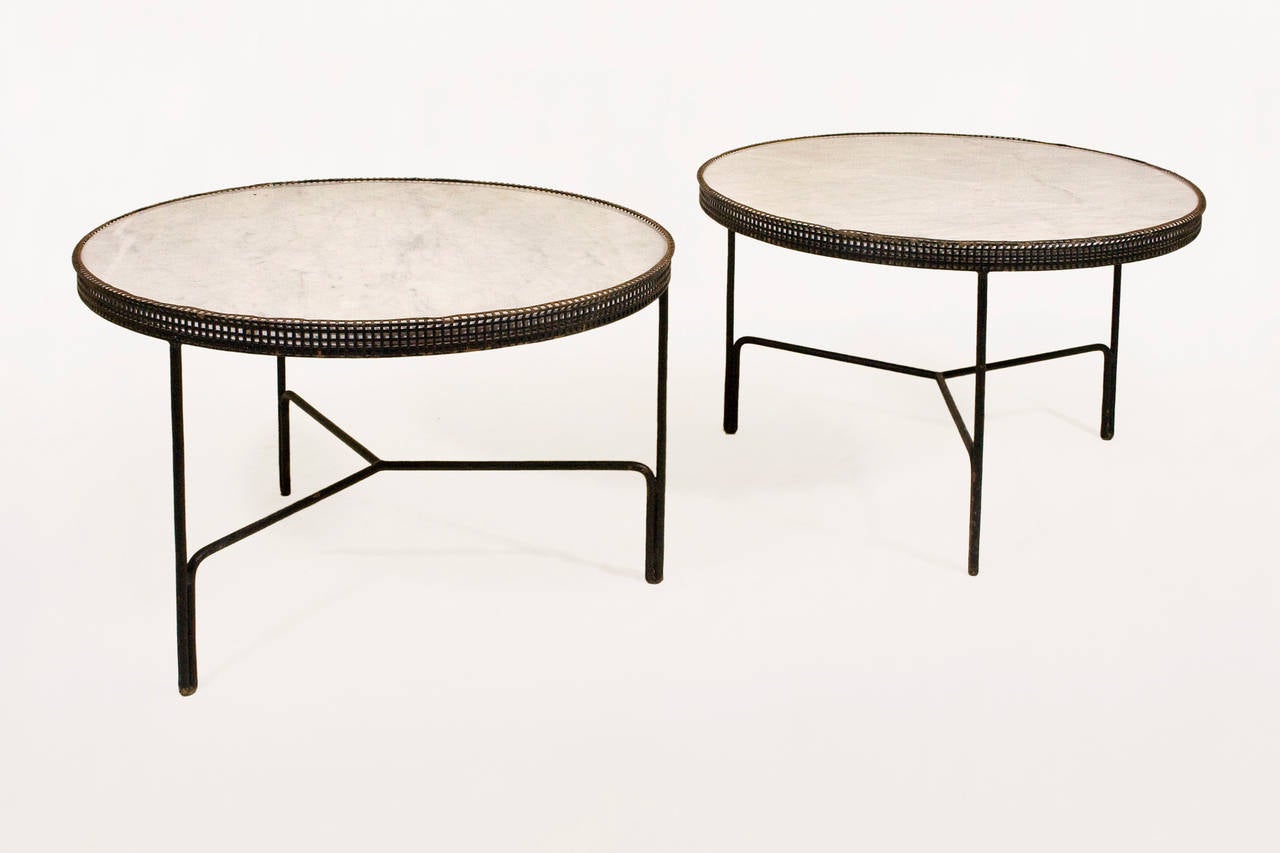 Pair of Mathieu Mategot coffee tables.
Manufactured by Ateliers Matégot.
France, circa 1950.
Lacquered metal legs and structure.
Perforated metal and original marble top.
Extremely rare to find such a set.
Providence: Private Residence in