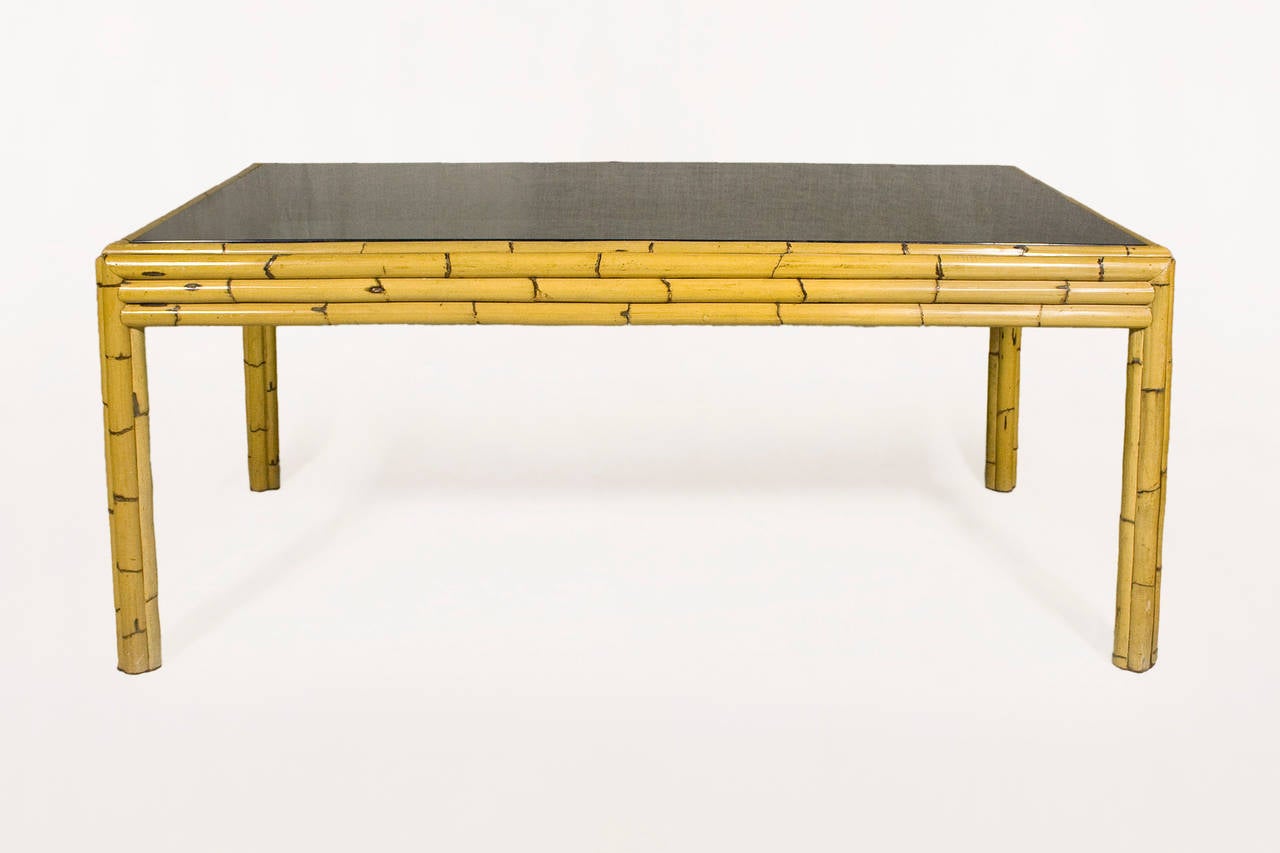 Bamboo and smoked glass dining table,
circa 1970, France.
Perfect vintage condition.