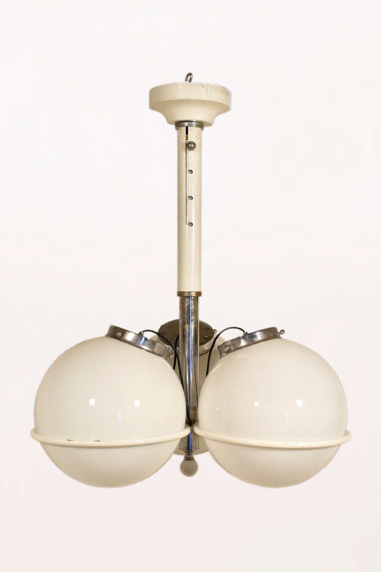 Chandelier after Gino Sarfatti, circa 1965`s, Italy.
Lacquered metal, chromed metal, frosted glass globes.
Vintage condition, need to be rewired.