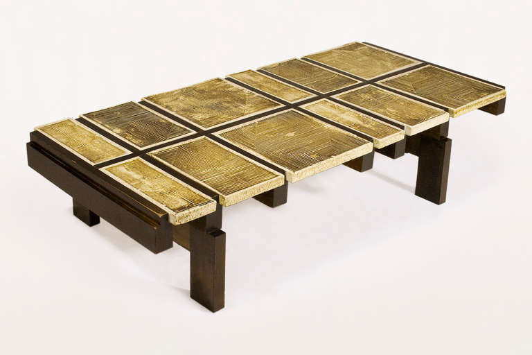 Roger Capron Ceramic Tile Coffee Table<br />
Coffee table with tiled lava stone top and wooden base<br />
Designed by Roger Capron, signed<br />
French, circa 1971<br />
Excellent Vintage Condition<br />
Published on page 108 of Roger Capron