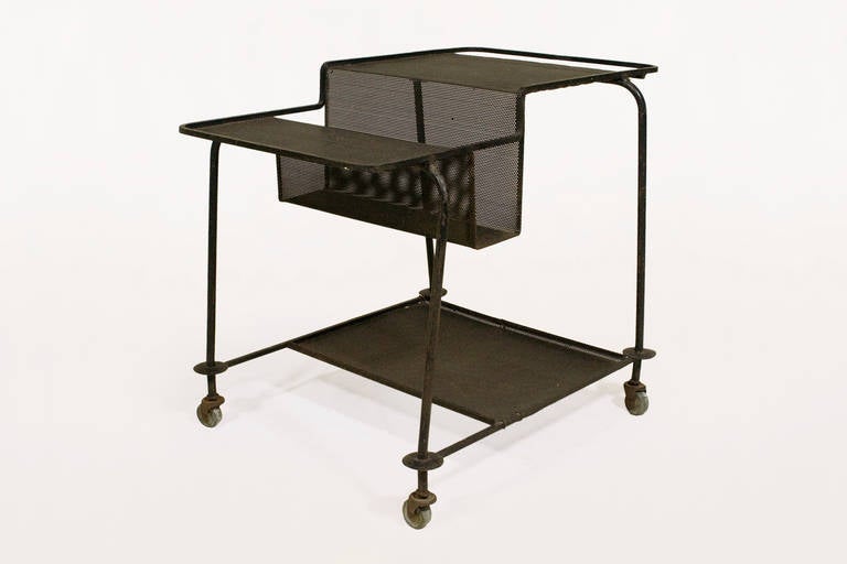 Mathieu Mategot Trolley Table and Magazine Rack
Black Lacquered, Perforated Metal
Circa 1950s, France
Documentation: 
