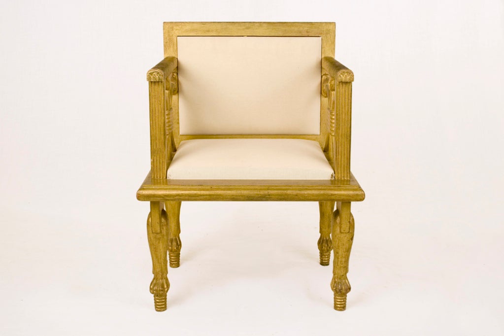 Pair of gilded wooden Neo Egyptian armchairs, based on a Pharaoh's Throne. Circa 1970. Ready to be covered.