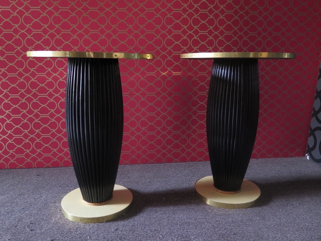 Beautiful pair of tables in parchment, French. With brass edge. Very nice drawing of parchment on the table top. Elegant and original even the central leg in black lacquered wood. On the sides of a nice sofa with on two originals Murano