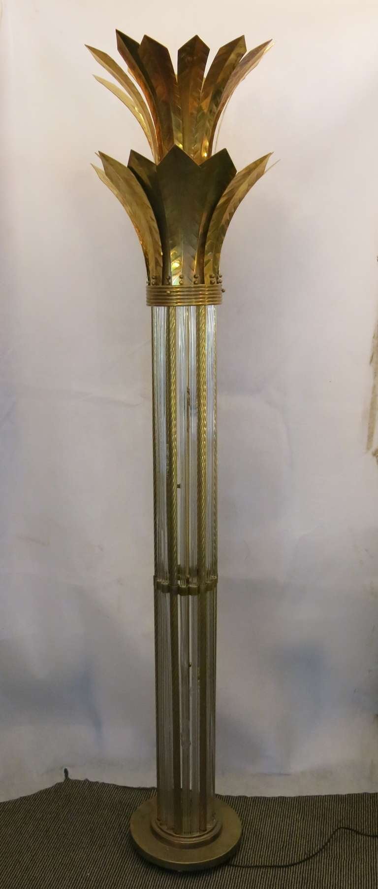 Particular floor lamp in Murano glass and brass. Very tall and important. Piece truly unique. Will light both above and within the body.