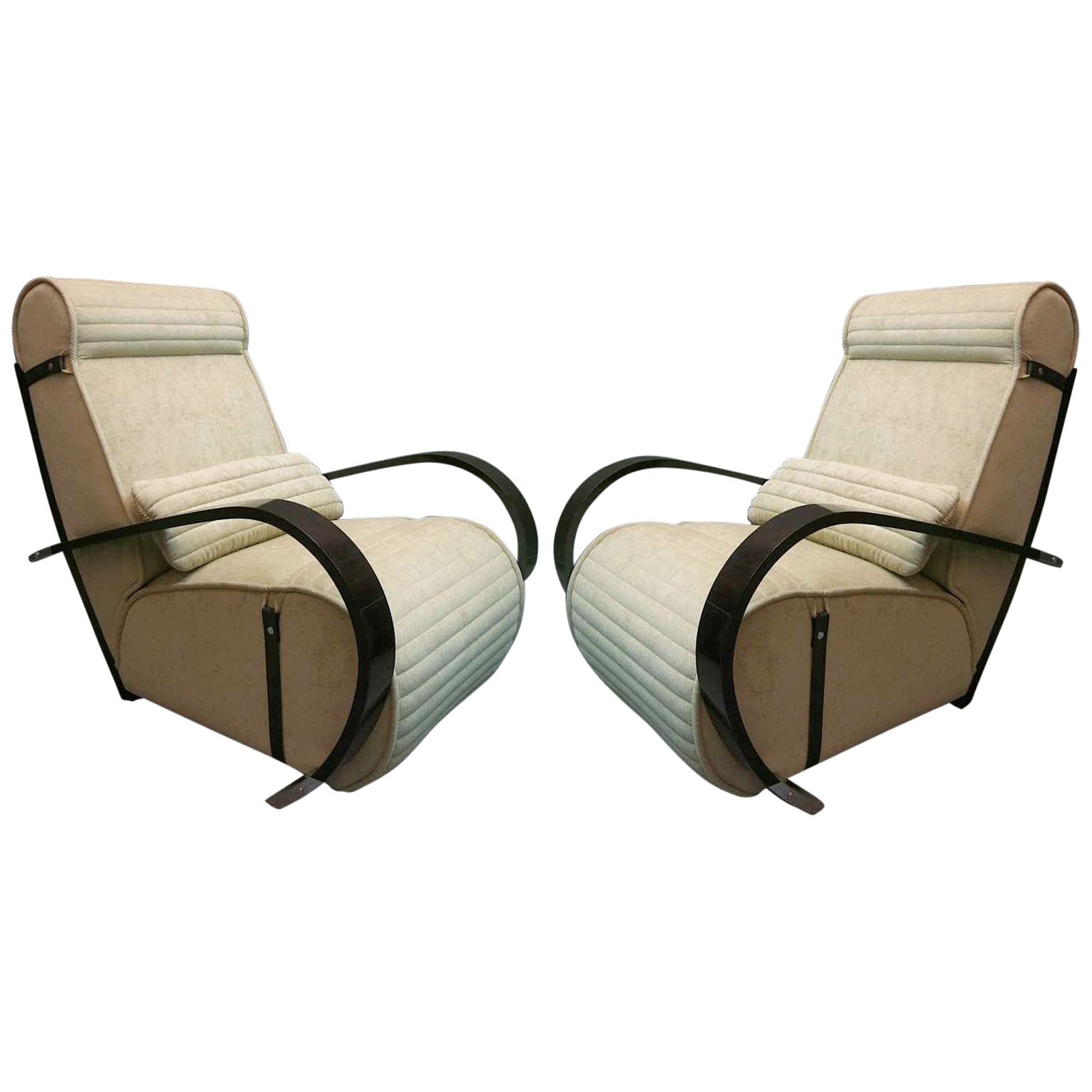 Futuristic design, and pure elegance for a pair of lounge chairs.

All covered in Fine velvet in dove grey color. It has a large rounded seat with transversal stitching in the lower part. The backrest is also covered in fine velvet in dove grey