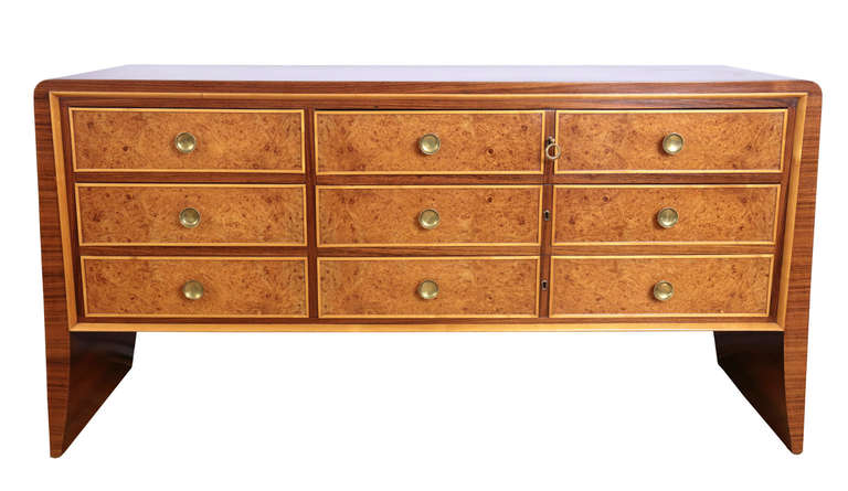 Italian  1930's Chest of drawer on luxury exotic wood , solid maples and maples burl.
The handles are in bronze.
Six drawers on the left three little and on the right three bigger.
Original key.