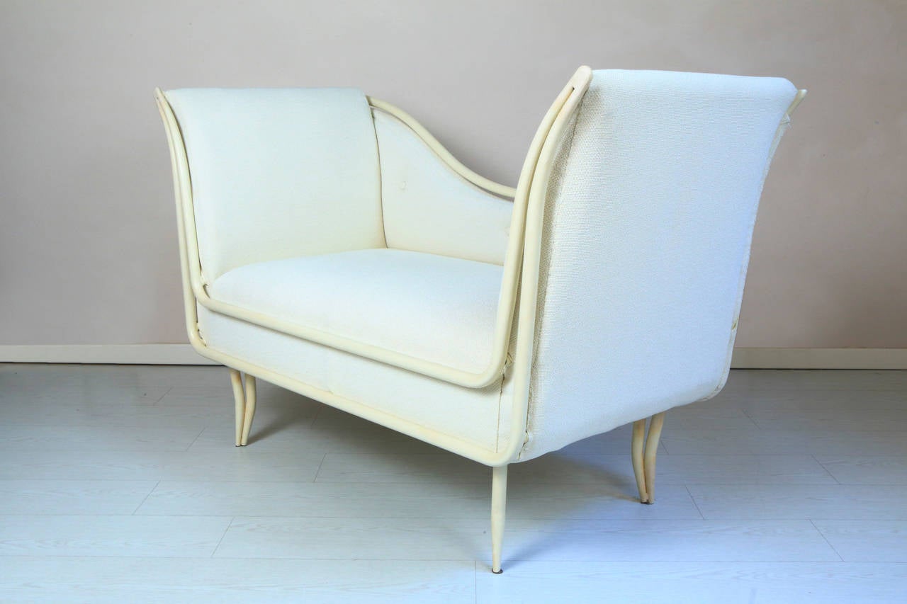 White lacquered handmade iron structure, upholstered with beige cotton fabric. 