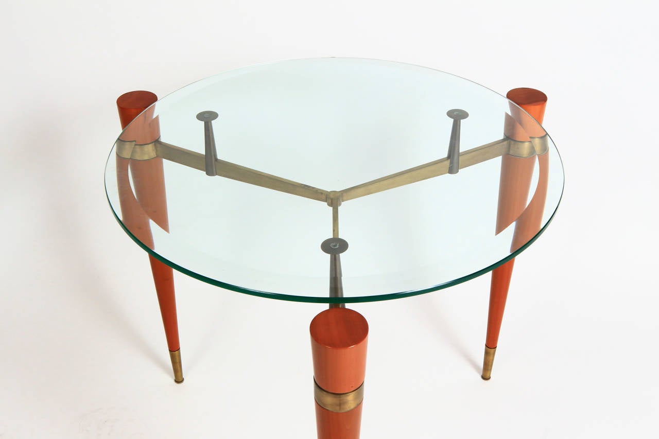 Solid cherry and solid brass sructure, top on thick beveled glass.