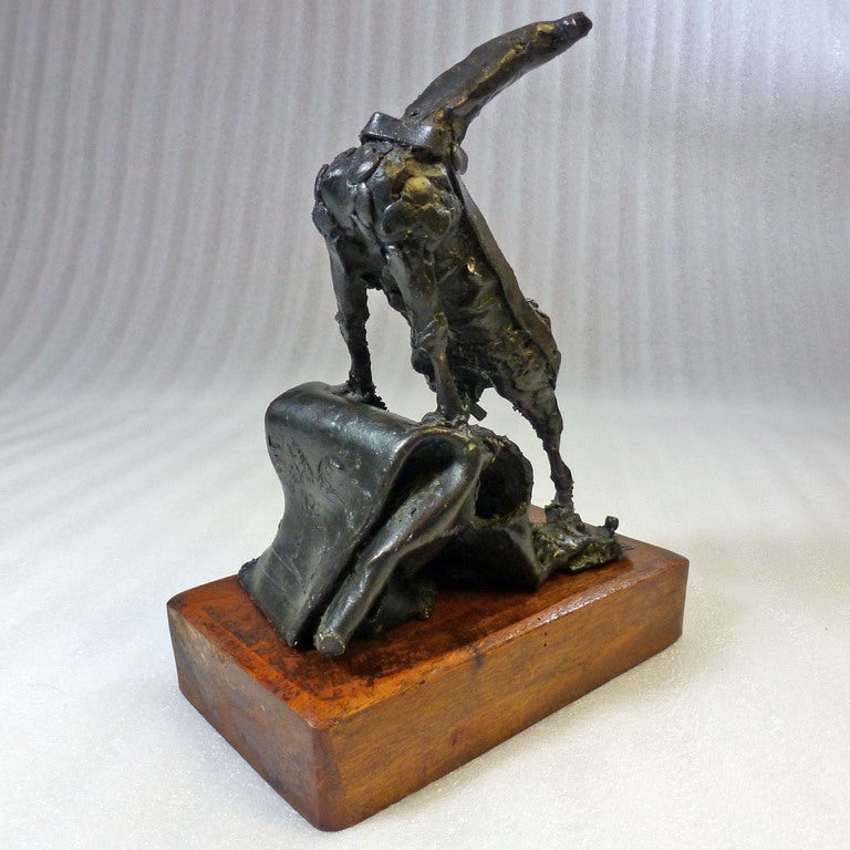 Sculpture of a horse that drags the dead bull after bullfight in bronze, wood base, in black bronze and wood base with lacquer loss, signed H. Juarez.