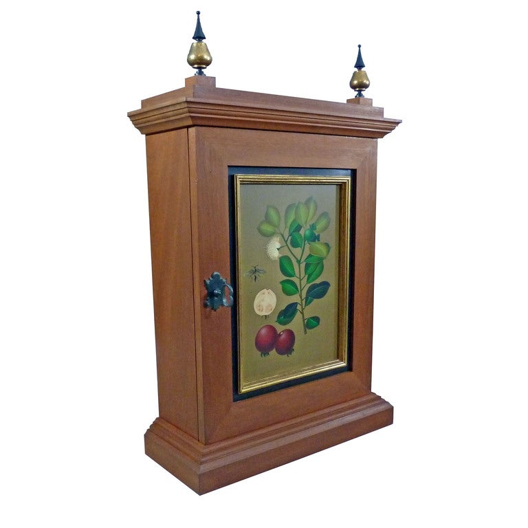Small mahogany cabinet, with elements in iron and gilded wood with an oil painting in front of plants, fruits and one insect. Excellent quality, materials and assembly, manufactured by Mexican artist Alejandro Rangel Hidalgo.