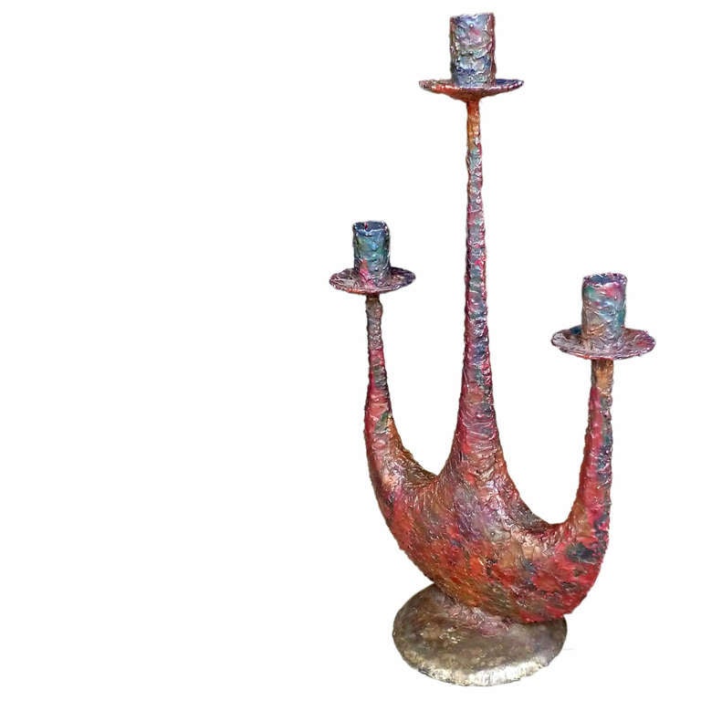 Brutalist candlestick with beautiful patina in red mainly, with brass base and copper details.