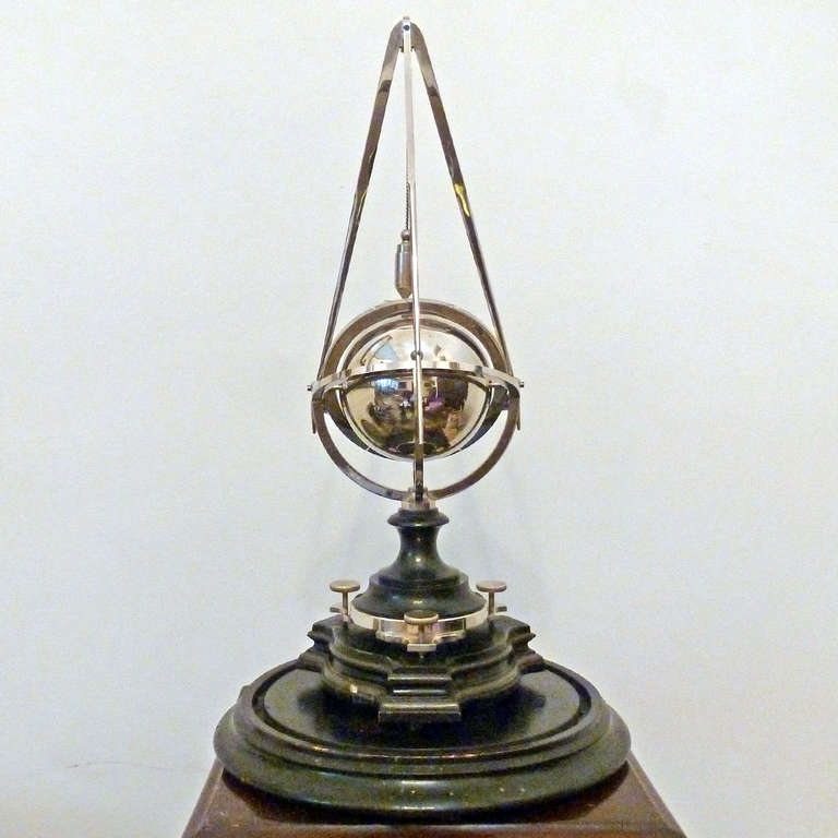 Mystery clock by Andre Romain Guilmet, circa 1880, three legs compass on world clock.