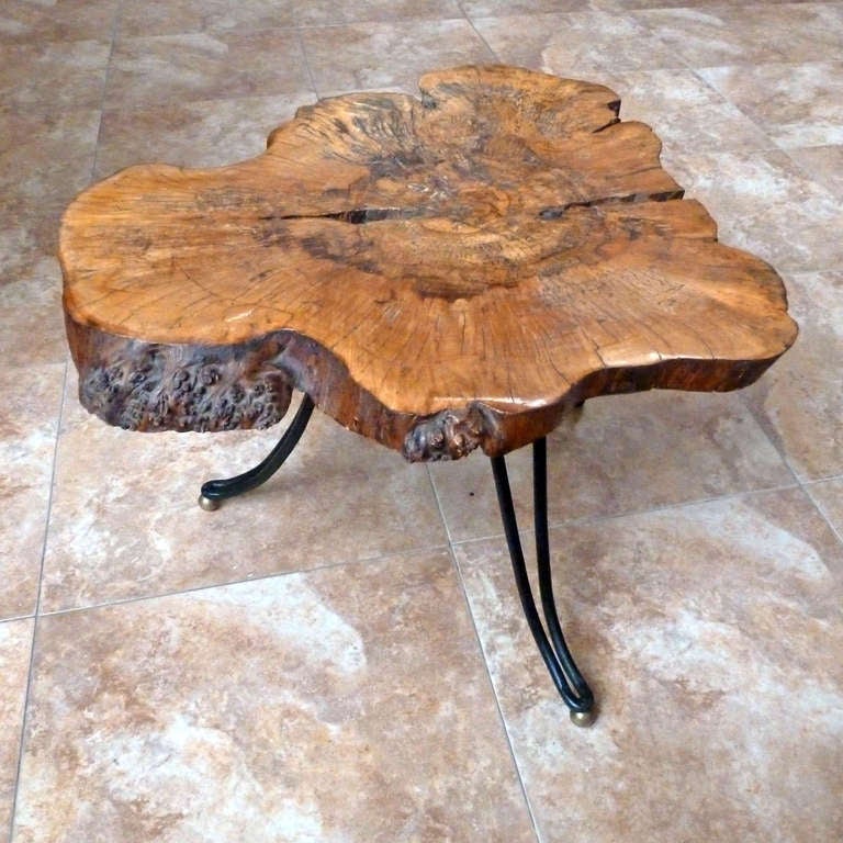 Tree Stump Table in very good condition, with iron legs and brass balls, from the sixties
