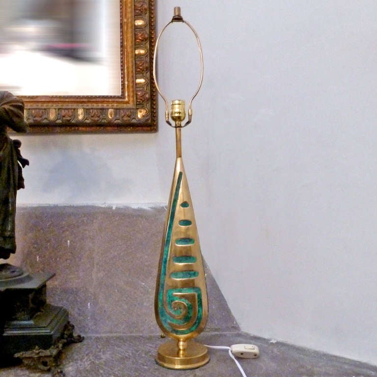 Pepe Mendoza Brass  Lamp, prehispanic motif design, excellent condition, no scratches or lost, and shocks, new electrical wiring.
Height from base to socket 23.62 inches
