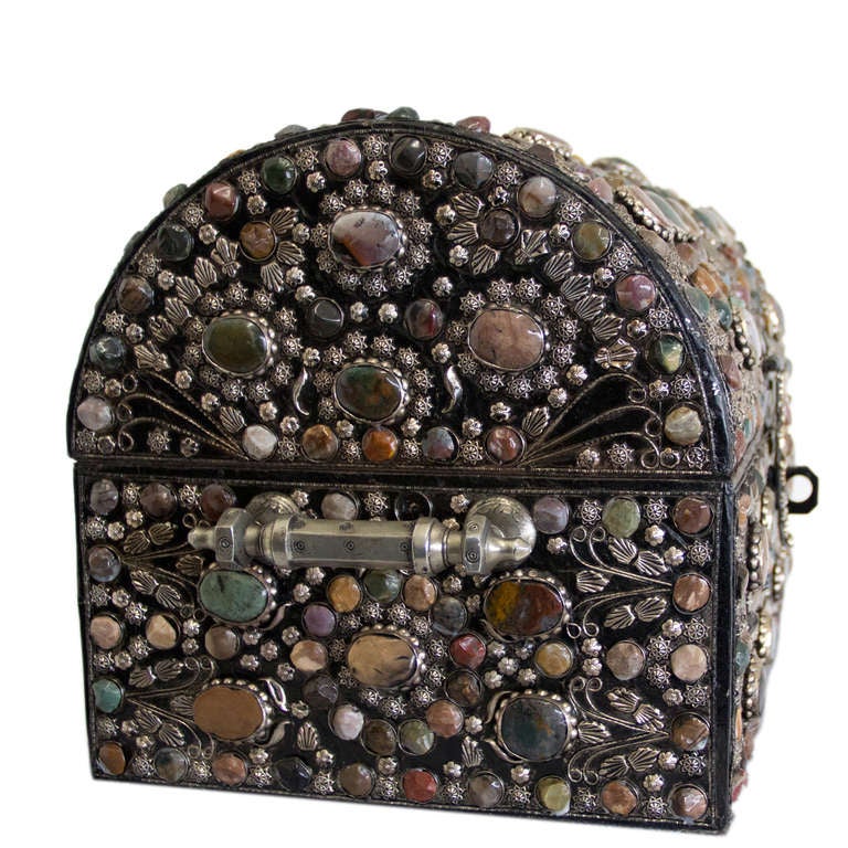 A Baroque style chest with hardstones and silver inlay embellished on leather and wooden box.