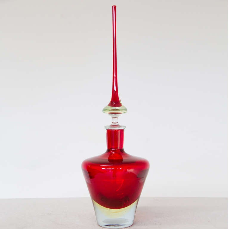 Multi colored murano glass decanters. This group of very elegant decanter / vases with tops.