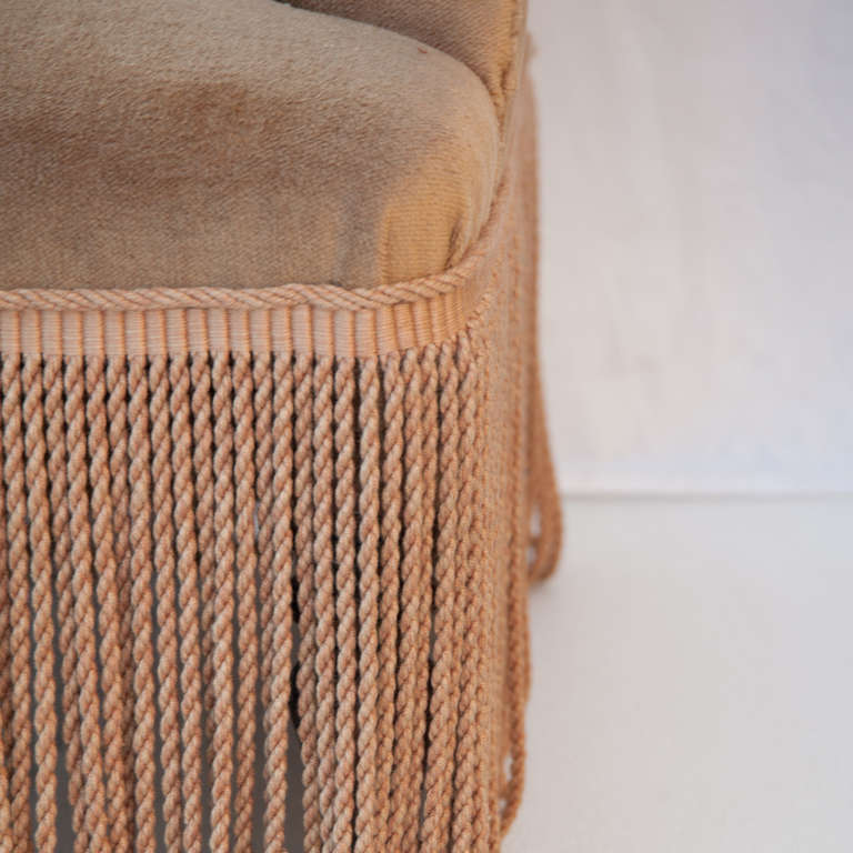 These newly mohair upholstered chairs feature long fringes. Very good condition.