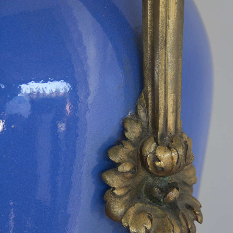 Out of a New York estate is this beautiful enameled blue Empire vase from France.