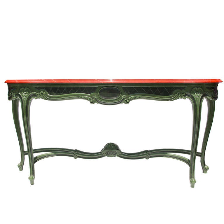 A pair of wooden lacquered console tables with faux marble tops.