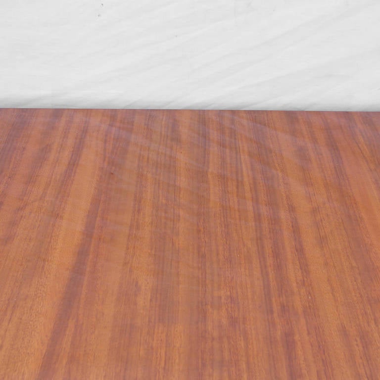 A beautiful, excellent blonde rosewood (Macassar) table by the Belgian company 