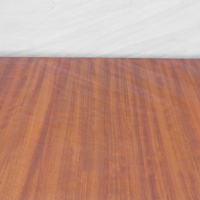 A beautiful, excellent blonde rosewood (Macassar) table by the Belgian company 