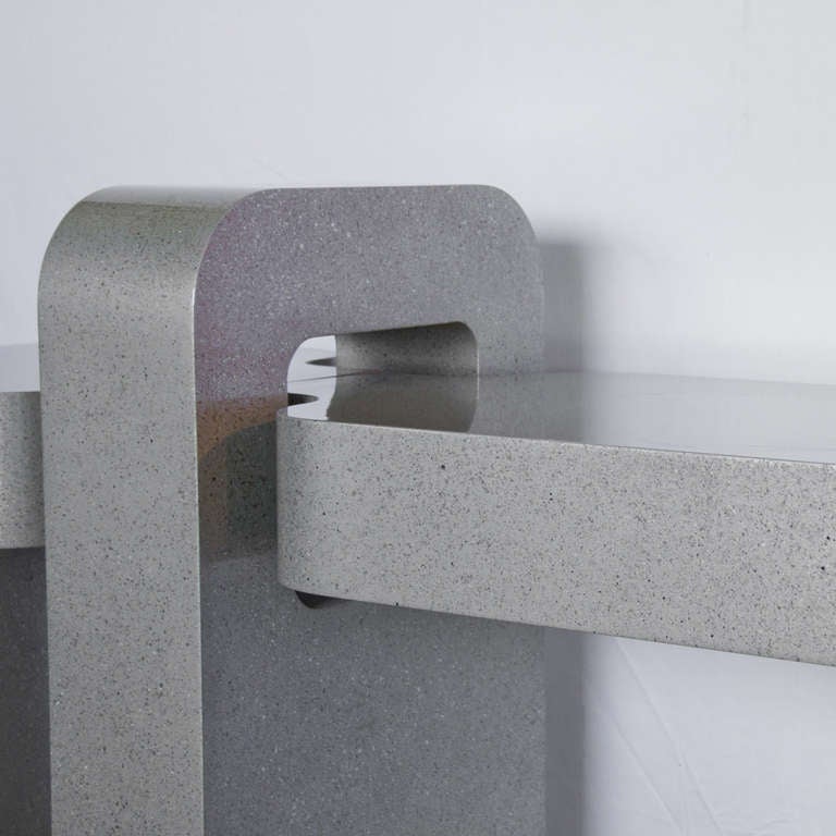 A laminate console table from the 1970s. 
Color is beige or grey mica.