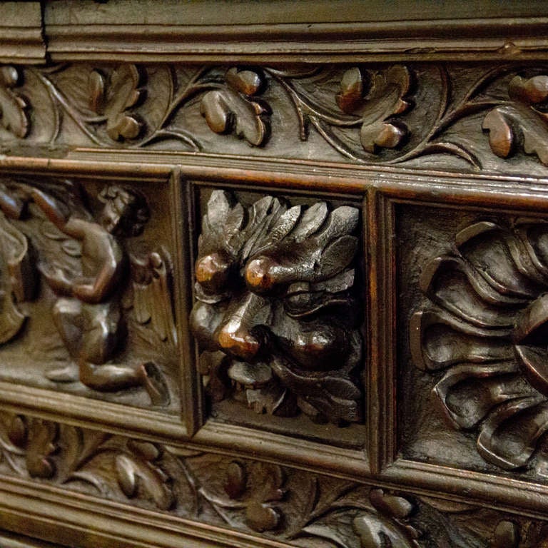 A walnut Nord Italian Cassone from the late 17th Century with typical carving