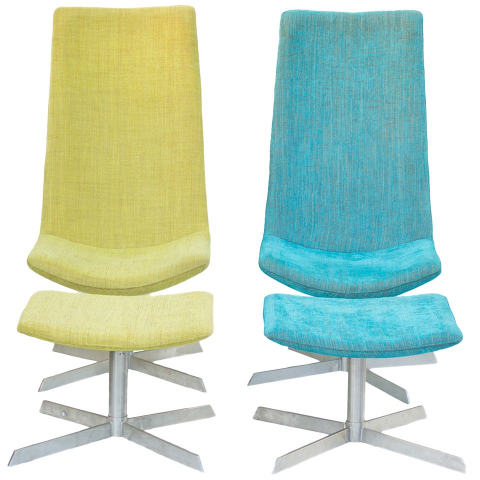 A Pair of Italian 1970's Swivel Club Chairs with Stools