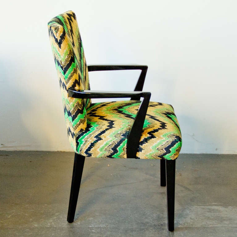 A pair of black lacquered side chairs with a Missoni style fabric.
Very elegant.