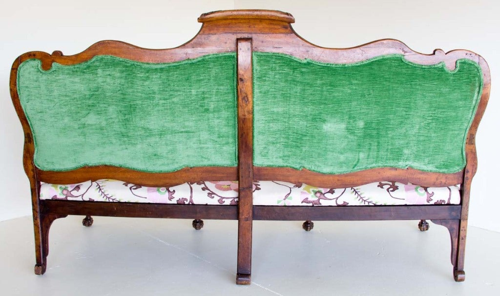 Walnut (newly) upholstered impressive hall bench from the Rococo period England. The embroidered upholstery is by Rubelli (Italy).