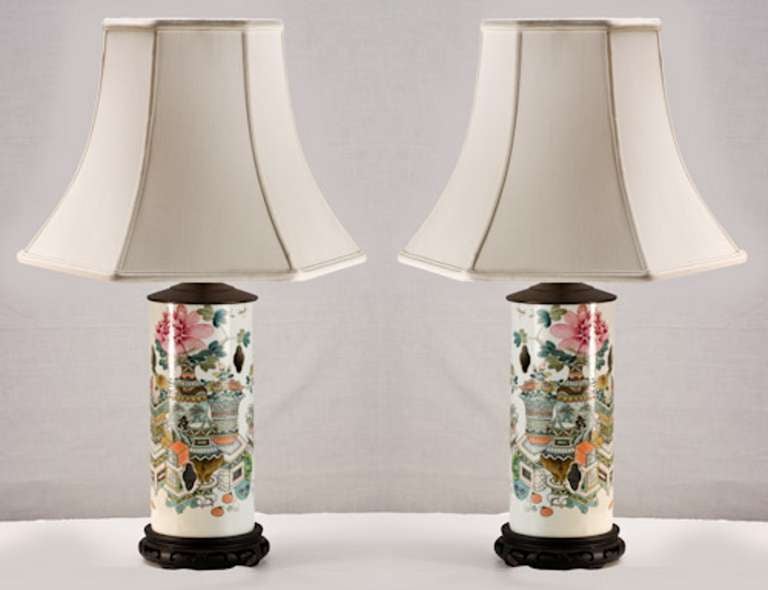 Late 19th century pair of wig stands converted to lamps.