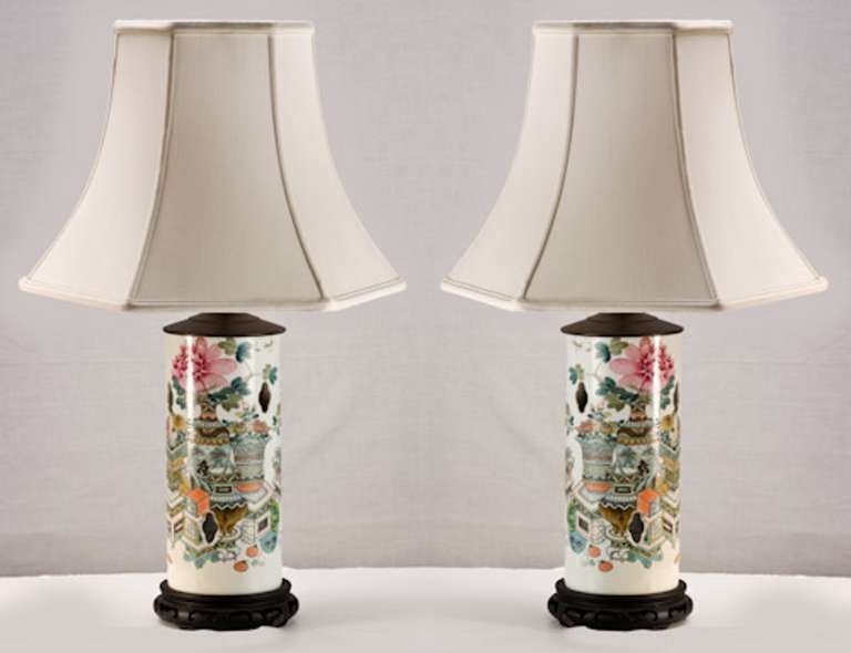 Late 19th century pair of wig stands converted to lamps.