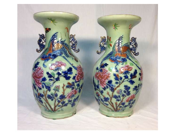 Pair of Chinese vases with a bird and floral motif.