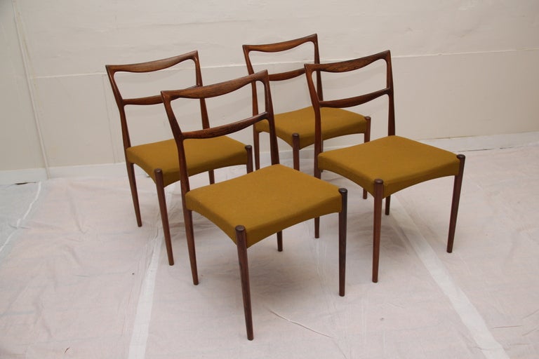 Set of 4 rosewood dining chairs by Danish designer, H.W. Klein, for Brahmin.