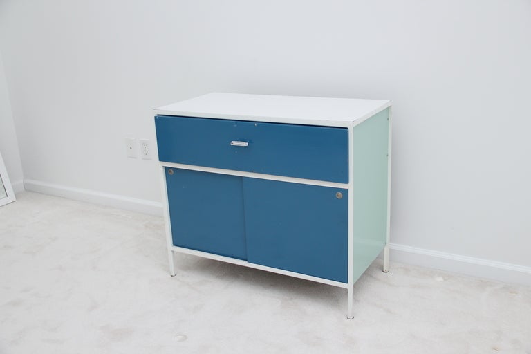 This listing includes 2 pieces, each priced at $1600. The pieces include a cabinet and a desk from the George Nelson Steel Frame Series for Herman Miller. Both pieces were purchased from the original owner who purchased them in the early 1960s from