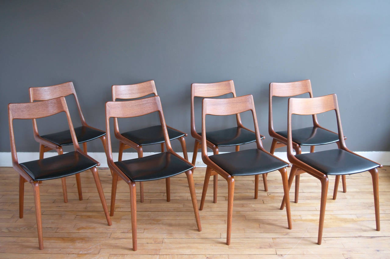 A set of eight solid teak 