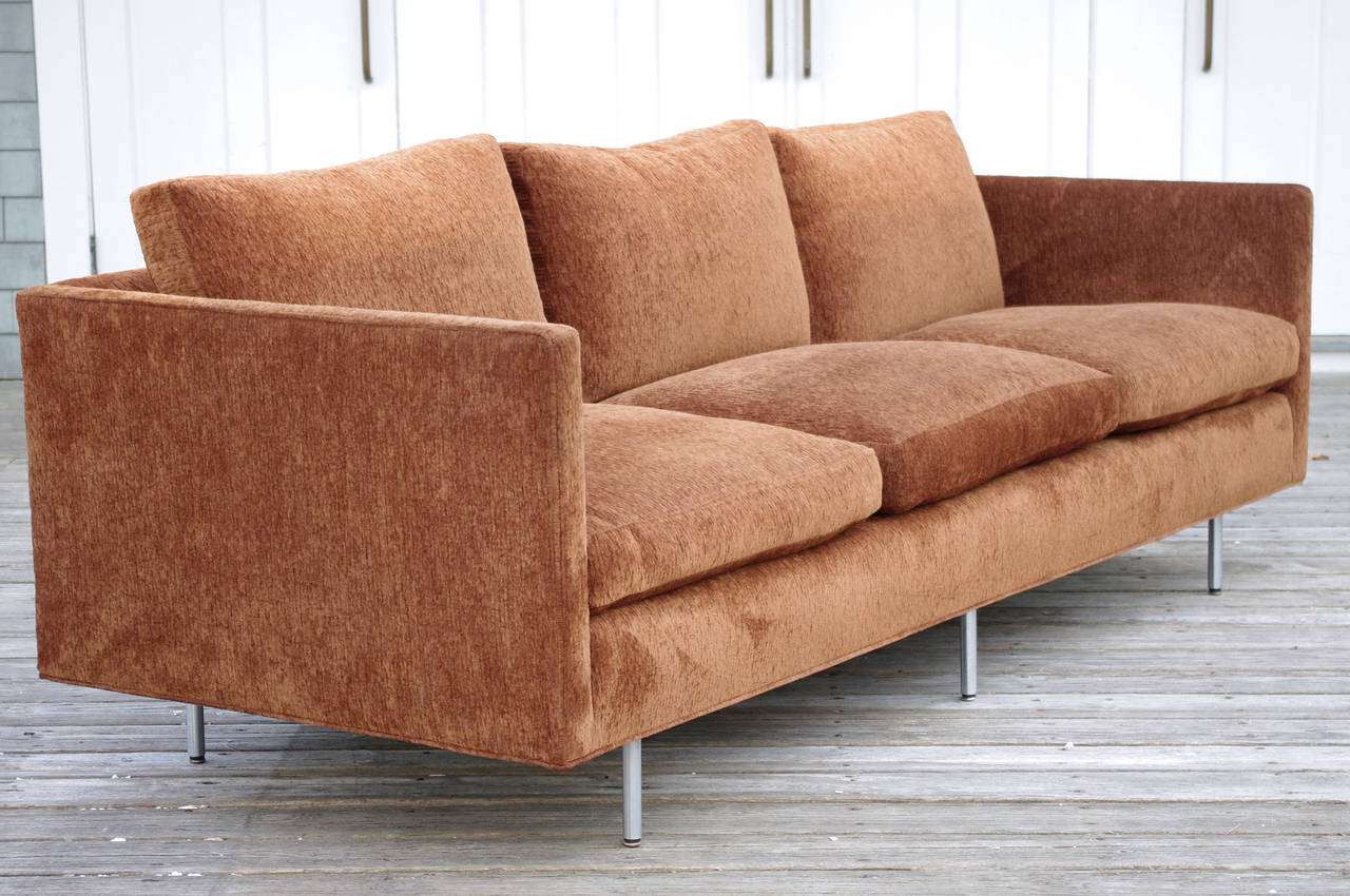 A comfortable three-seat sofa by Knoll with tubular brushed steel legs, circa 1960. 

Please contact dealer to discuss upholstery services.