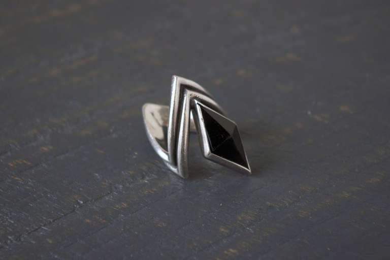 A sterling silver and black onyx ring by Mexican silversmith Antonio Pineda, circa 1960.