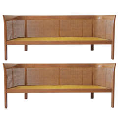 Pair of Erwin-Lambeth Walnut and Cane Settees