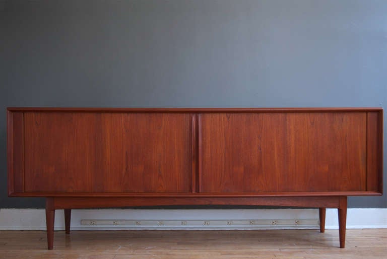 A large Danish teak credenza by Bernhard Pedersen & Son with tambour doors, circa 1960.

Recently refinished by RESIDE and in excellent condition.