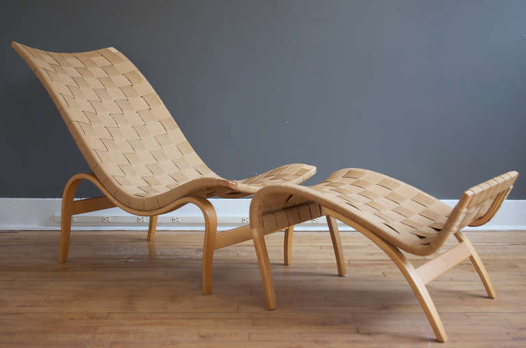 A low lounge chair and ottoman by Bruno Mathsson, ca. 1970.

The lounge chair measures 42