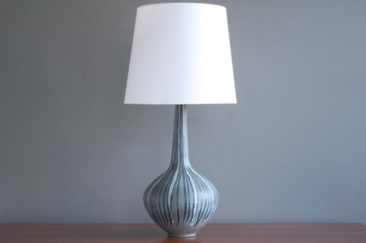 A tall ceramic table lamp fashioned from a Karlsruhe Pottery vase, ca. 1960. Factory mark to bottom.