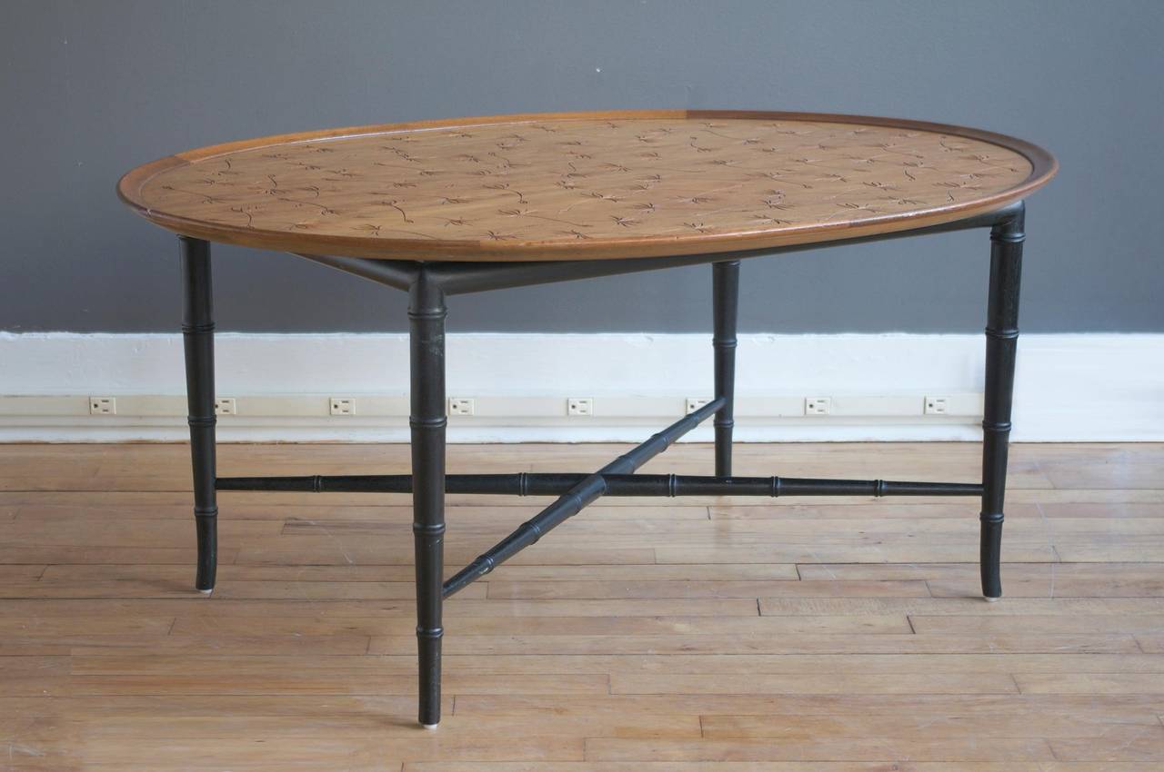 An elegant oval mahogany coffee table by the Kittinger Company, ca. 1950.